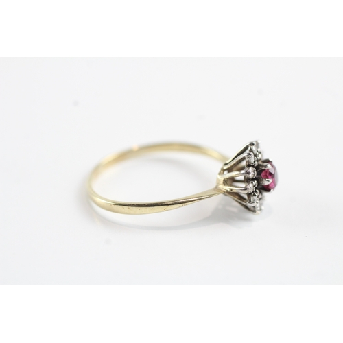 150 - 9ct gold red gemstone and diamond halo dress ring (1.9g) Size P