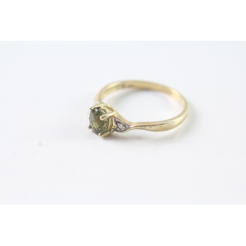 157 - 9ct gold green gemstone & diamond dress ring (1.8g) Size P