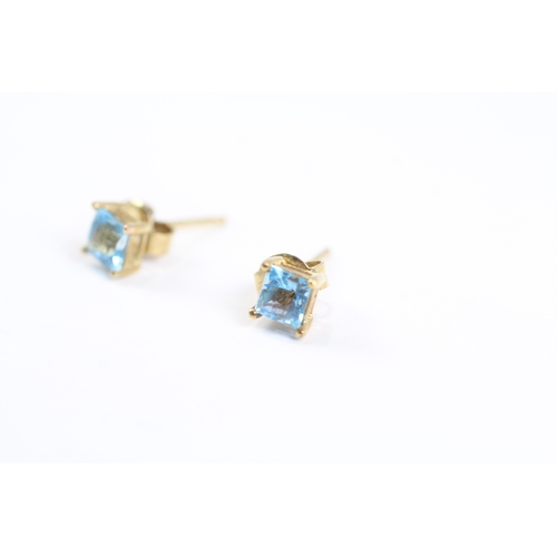 158 - 9ct gold square cut blue gemstone stud earrings (0.9g)