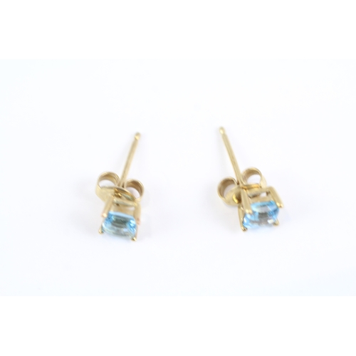 158 - 9ct gold square cut blue gemstone stud earrings (0.9g)