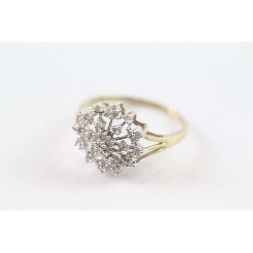 171 - 9ct gold diamond cluster dress ring (2.3g) Size Q 1/2