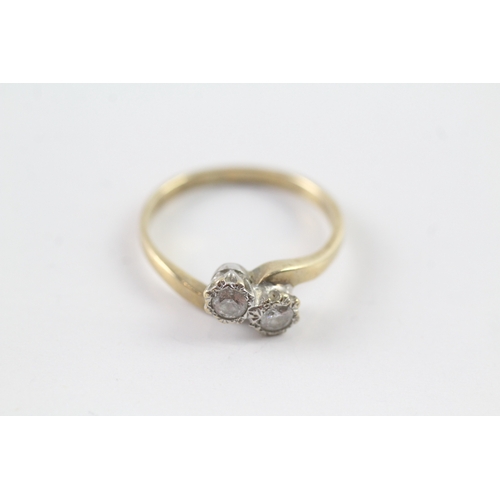 172 - 9ct gold diamond bypass dress ring (2.3g) Size P