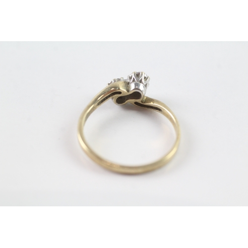 172 - 9ct gold diamond bypass dress ring (2.3g) Size P