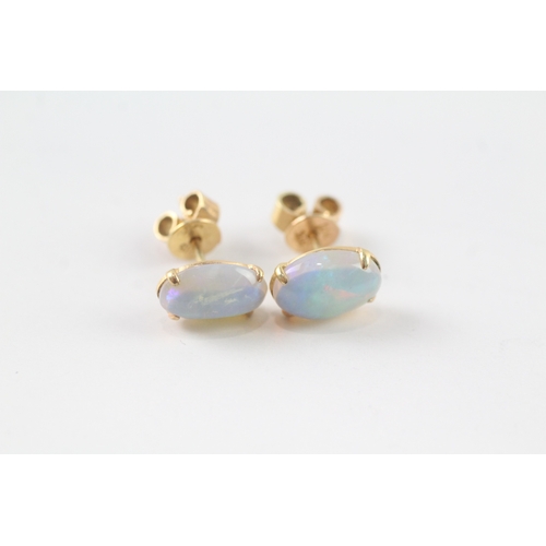 176 - 14ct gold jelly opal stud earrings (2.7g)