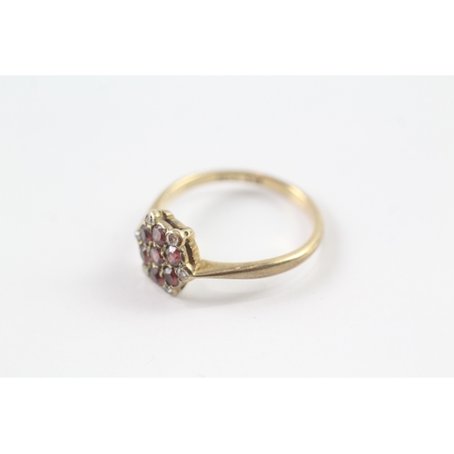 179 - 9ct gold garnet and diamond floral cluster dress ring (1.8g) Size M