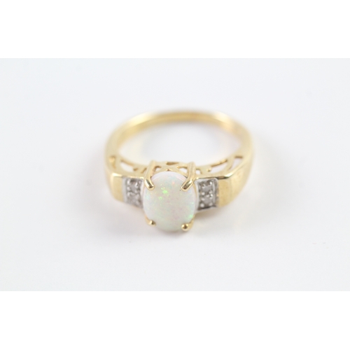 180 - 9ct gold cabochon cut opal dress ring w/ diamond set shoulders (3.5g) Size N 1/2