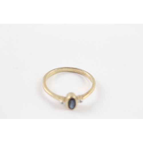 185 - 9ct gold diamond and sapphire ring Size O