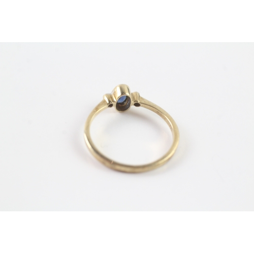 185 - 9ct gold diamond and sapphire ring Size O