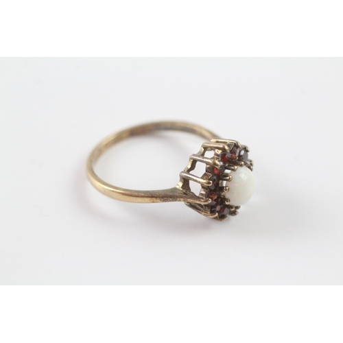 190 - 9ct gold garnet and opal ring Size O