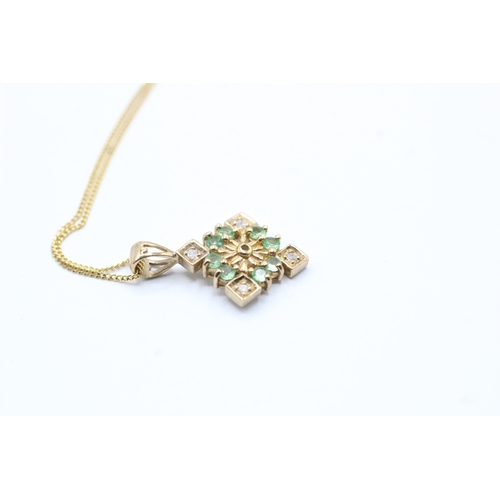 206 - 9ct gold green gemstone and diamond pendant on chain (1.9g)