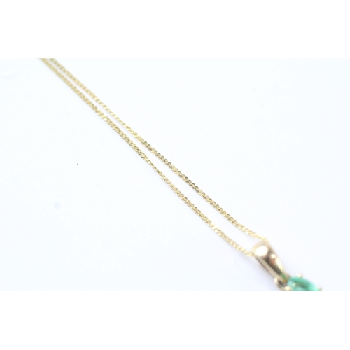 210 - 9ct gold oval cut emerald drop pendant necklace (1.7g)