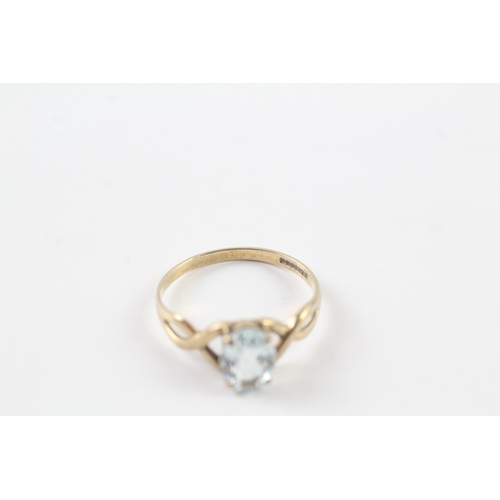 213 - 9ct gold blue gemstone ring Size N 1/2