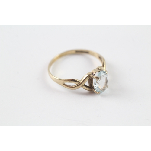 213 - 9ct gold blue gemstone ring Size N 1/2