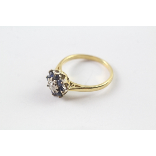 219 - 18ct gold diamond and sapphire flower cluster ring Size L