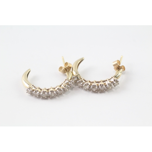 225 - 9ct gold and diamond half hoop stud earrings (1.8g)