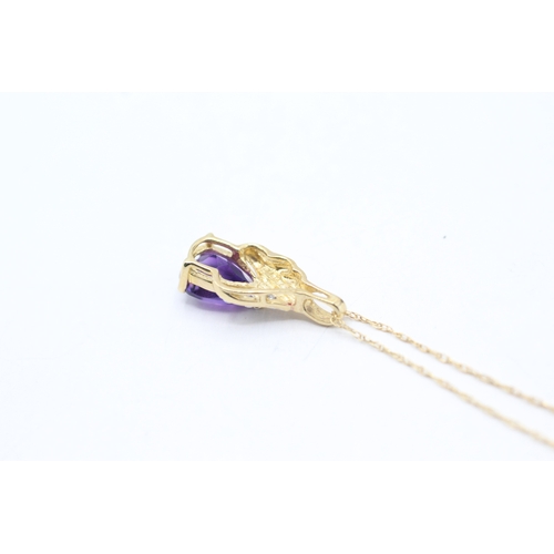 236 - 9ct gold amethyst and white gemstone pendant on chain (1.5g)