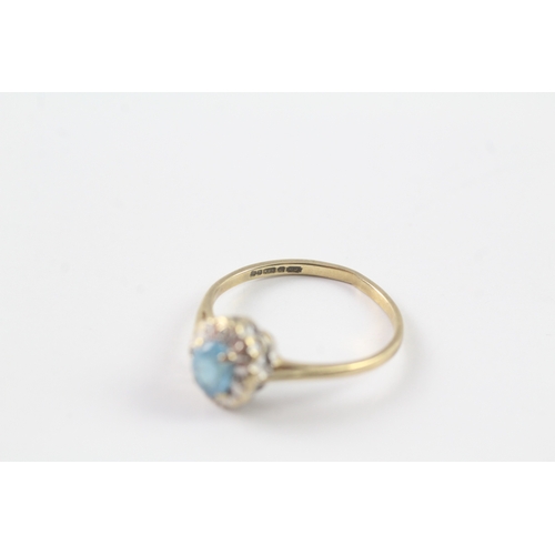 237 - 9ct gold blue gemstone and diamond halo set ring Size N