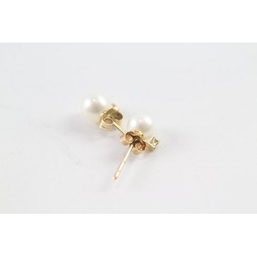 248 - 14ct gold cultured pearl and diamond stud earrings (0.7g)