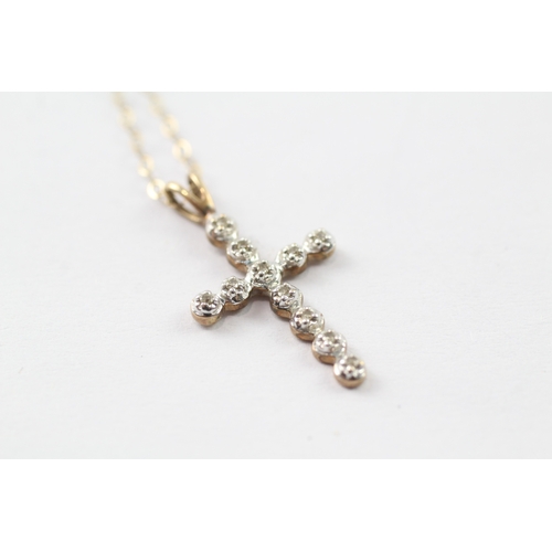 250 - 9ct gold diamond cross pendant on chain (1.3g)