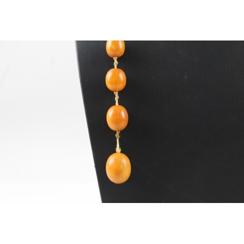 267 - Antique Eggyolk Amber Beaded Necklace 38g