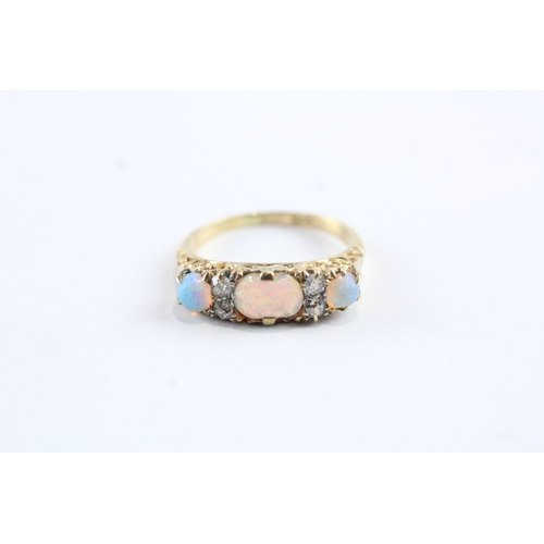 32 - 18ct gold opal and diamond set ring Size M