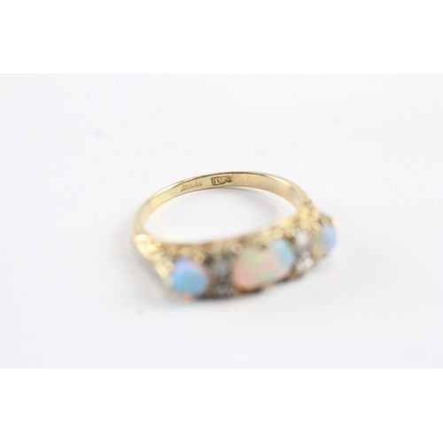 32 - 18ct gold opal and diamond set ring Size M