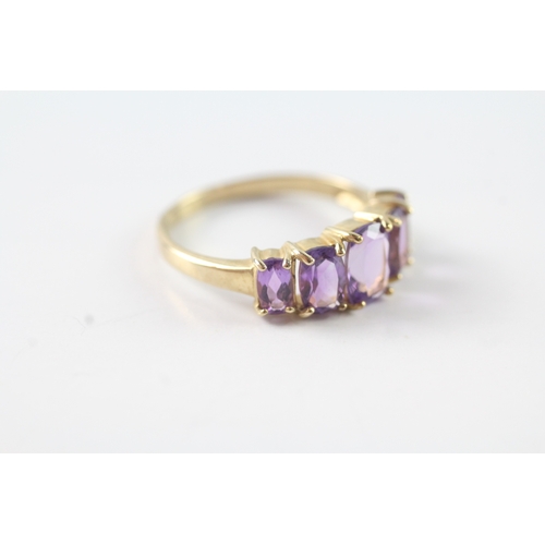 50 - 9ct gold graduated amethyst five stone dress ring (2.2g) Size P