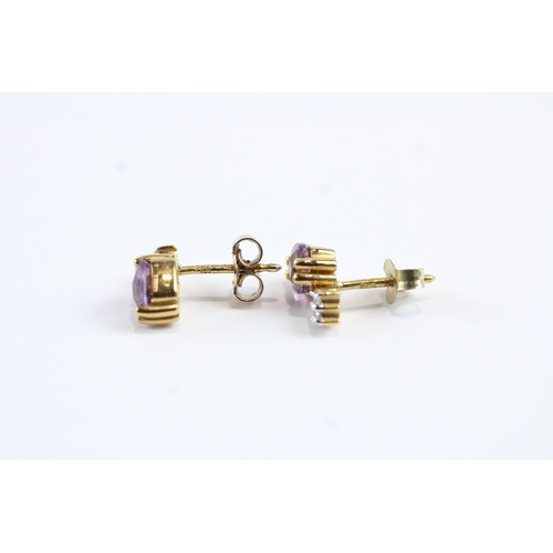 51 - 9ct gold amethyst and diamond stud earrings (2.3g)