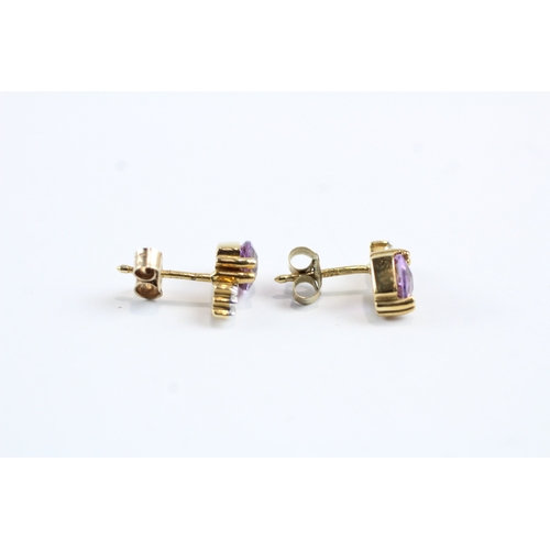 51 - 9ct gold amethyst and diamond stud earrings (2.3g)