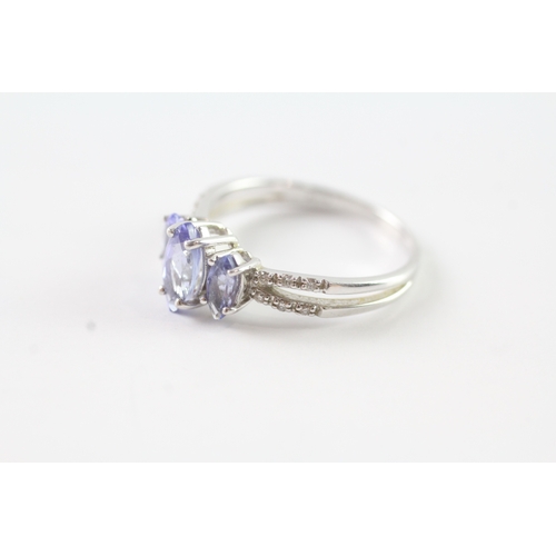 64 - 9ct white gold marquise cut tanzanite trilogy dress ring w/ diamond set shoulders (2.2g) Size N