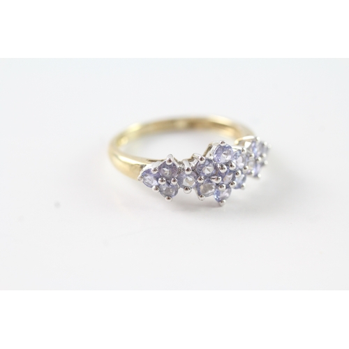 65 - 9ct gold tanzanite cluster dress ring (2.1g) Size N