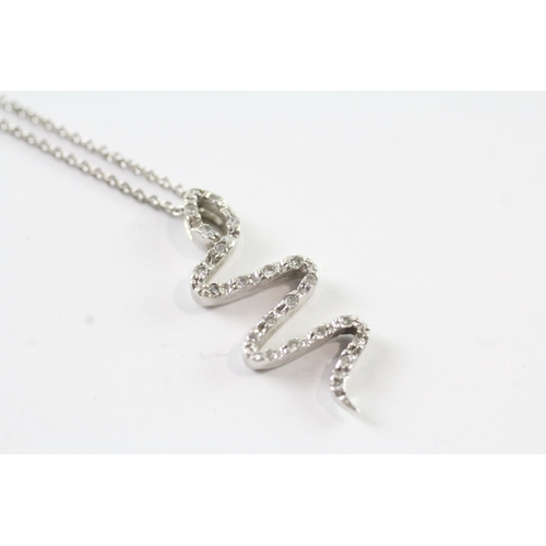 7 - 9ct white gold diamond snake pendant necklace (2.9g)