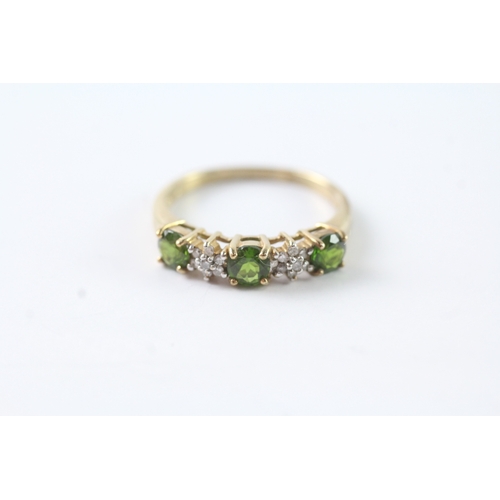 71 - 9ct gold green gemstone & diamond dress ring (2g)