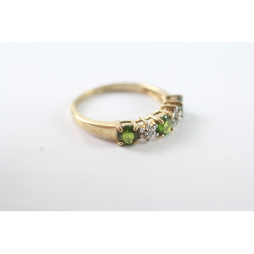 71 - 9ct gold green gemstone & diamond dress ring (2g)