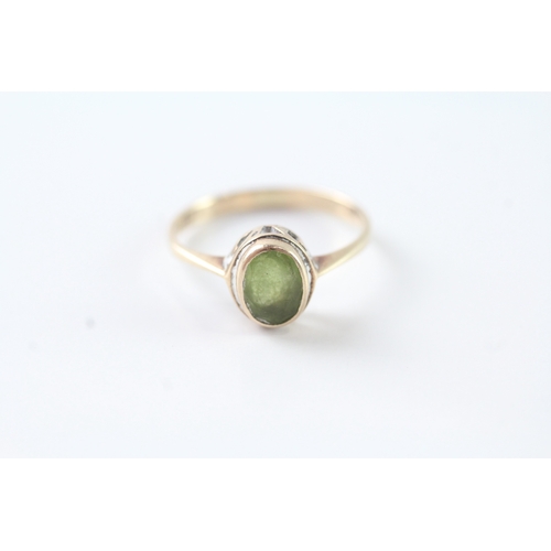 78 - 9ct gold oval cut peridot solitaire dress ring (1.9g) Size M