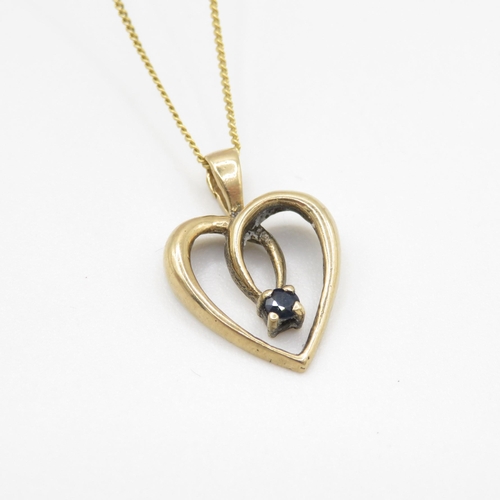 11 - 9ct gold sapphire set open heart pendant necklace (2.7g)