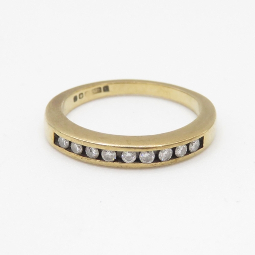 112 - 9ct gold channel set diamond half eternity dress ring (2.3g) Size K