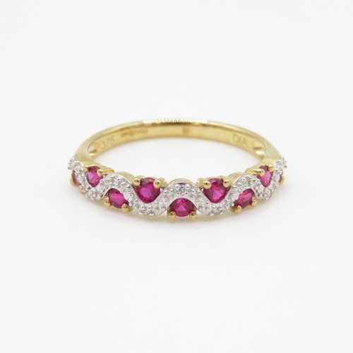 13 - 9ct gold ruby and diamond wave design dress ring (1.5g) Size N