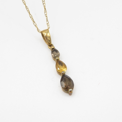 38 - 9ct gold pear cut smokey quartz and citrine set pendant necklace (1.5g)