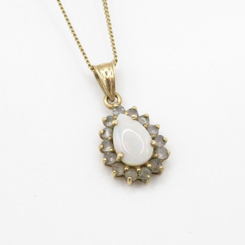 70 - 9ct gold opal and white gemstone pear pendant on chain (2.7g)