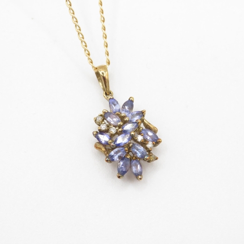 88 - 9ct gold tanzanite & diamond cluster pendant necklace (2.4g)