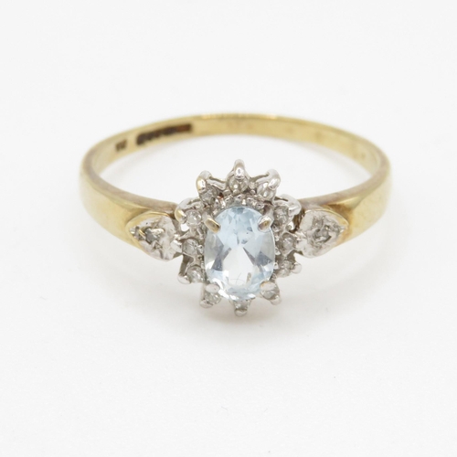 93 - 9ct gold aquamarine and diamond halo dress ring w/ diamond set shoulders (1.9g) Size P