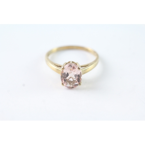 101 - 9ct gold oval cut pink gemstone solitaire dress ring (1.9g) Size N