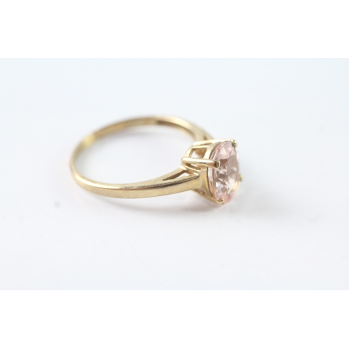 101 - 9ct gold oval cut pink gemstone solitaire dress ring (1.9g) Size N