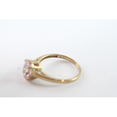 101 - 9ct gold oval cut pink gemstone solitaire dress ring (1.9g) Size N