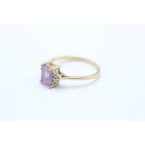 128 - 9ct gold amethyst & diamond dress ring (1.9g) Size P