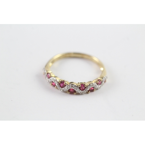 13 - 9ct gold ruby and diamond wave design dress ring (1.5g) Size N