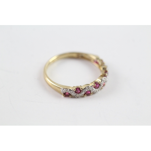 13 - 9ct gold ruby and diamond wave design dress ring (1.5g) Size N