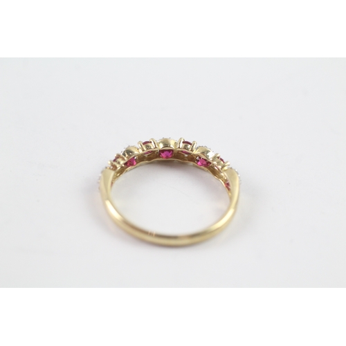 13 - 9ct gold ruby and diamond wave design dress ring (1.5g) Size N