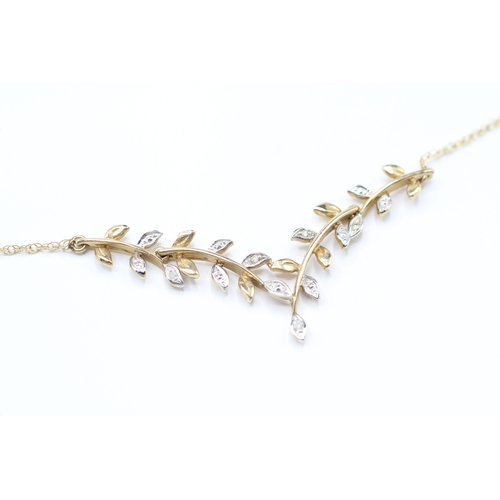 131 - 9ct white and yellow diamond vine branch necklace (2.8g)